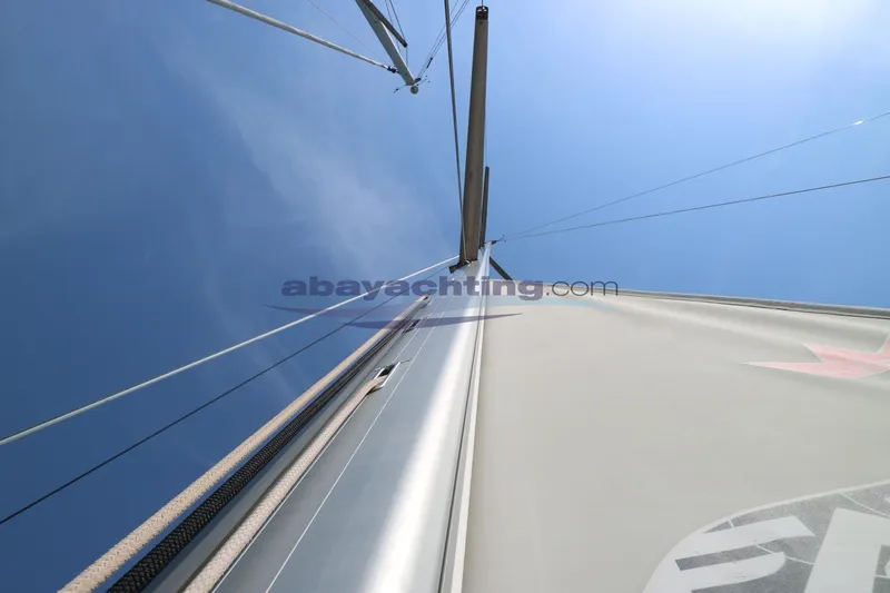  Yacht Photos Pics Looking up at the mast and sail of a 2016 Grand Soleil 46 LC yacht.