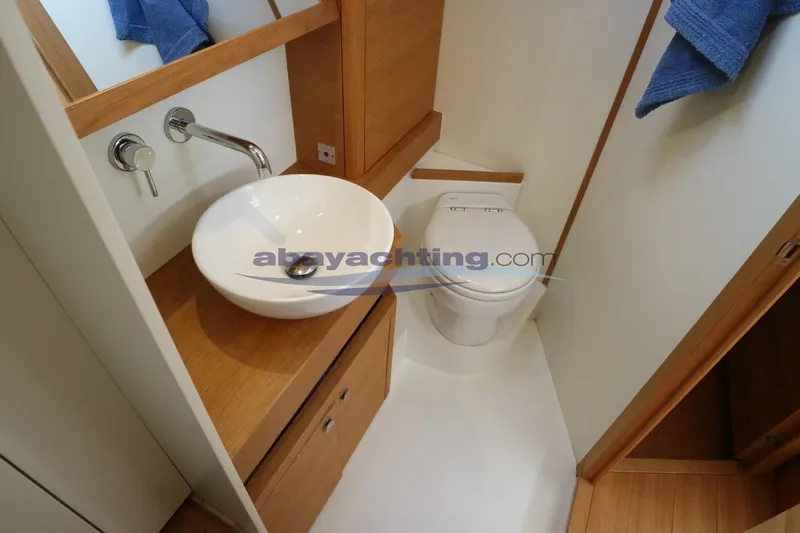  Yacht Photos Pics Modern bathroom in 2016 Grand Soleil 46 LC yacht with sink and toilet.