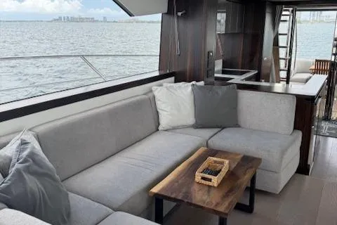 4 Play Yacht Photos Pics Luxurious interior of 2022 Sunseeker Manhattan 68 yacht with ocean view.