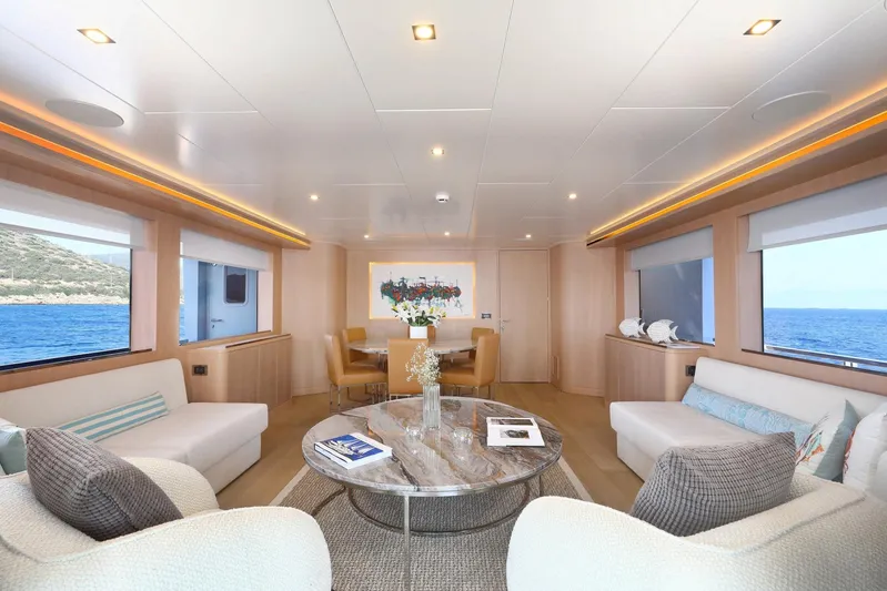 Tortura Yacht Photos Pics Luxurious interior of 2025 Aegean Explorer yacht with elegant seating and ocean view.