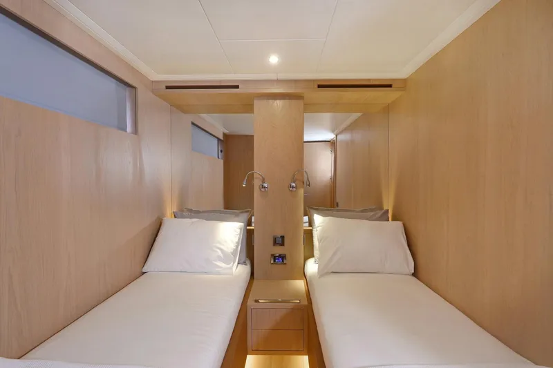 Tortura Yacht Photos Pics Twin cabin interior of 2025 Aegean Yacht Aegean Explorer, featuring modern wooden design.