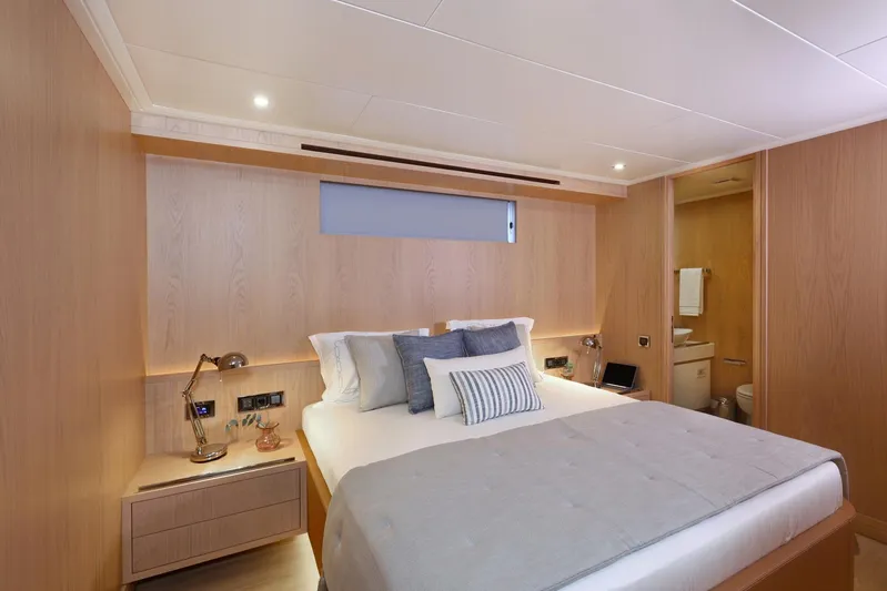 Tortura Yacht Photos Pics Luxurious bedroom interior of 2025 Aegean Yacht Aegean Explorer with modern design and cozy ambiance.