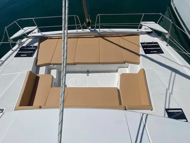  Yacht Photos Pics Bali 4.0 2017 catamaran with spacious sunbathing area and cushioned seating.