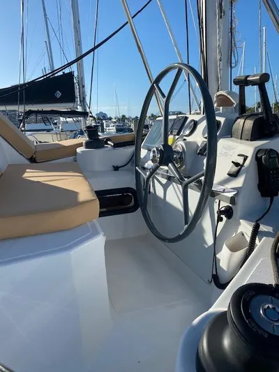  Yacht Photos Pics Cockpit of 2017 Bali 4.0 sailboat with steering wheel and navigation equipment.