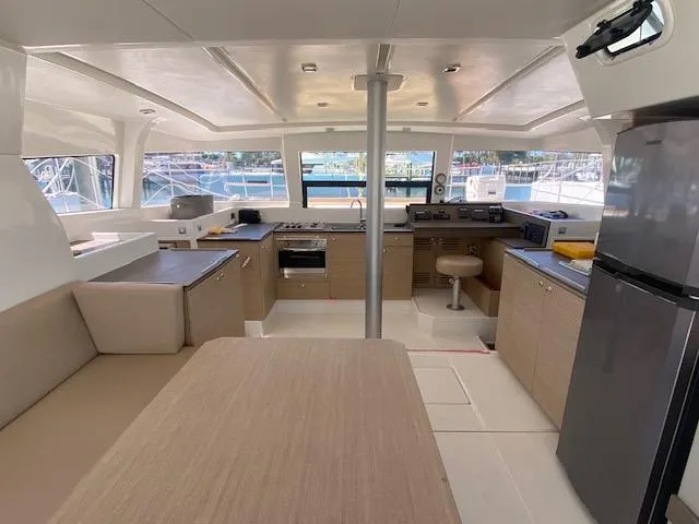  Yacht Photos Pics Interior of 2017 Bali 4.0 catamaran with modern kitchen and dining area.