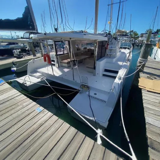  Yacht Photos Pics 2017 Bali 4.0 catamaran docked at marina, rear view.