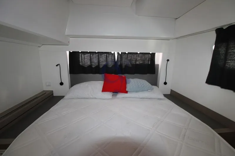  Yacht Photos Pics Cozy bedroom in 2021 Fountaine Pajot Astrea 42 catamaran with modern decor.