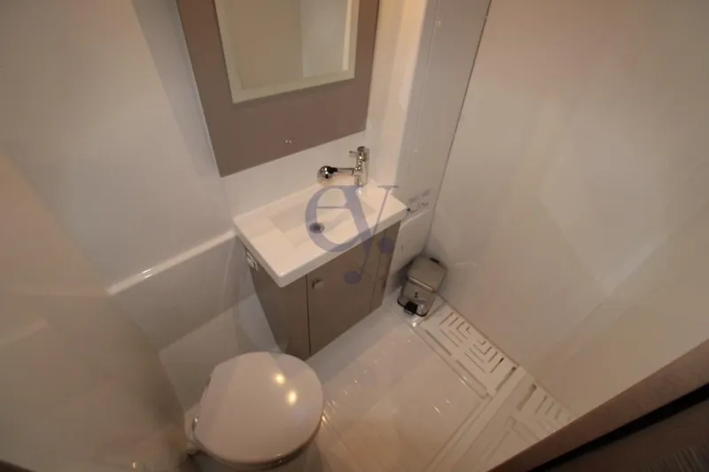  Yacht Photos Pics Bathroom interior of 2021 Fountaine Pajot Astrea 42 yacht, featuring modern fixtures.