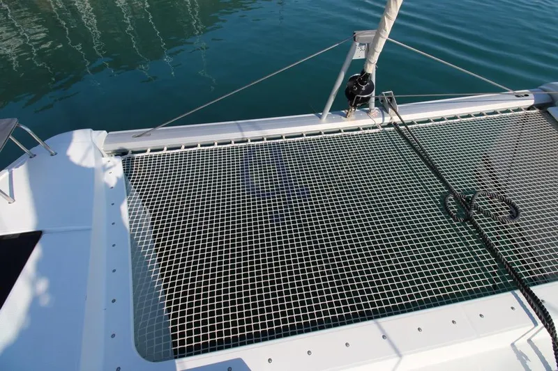  Yacht Photos Pics Fountaine Pajot Astrea 42 catamaran netting over water, 2021 model.