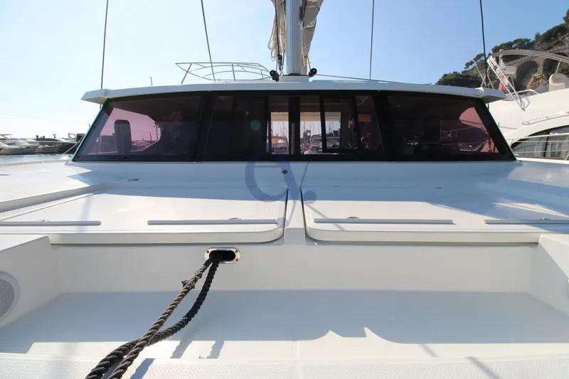  Yacht Photos Pics 2021 Fountaine Pajot Astrea 42 catamaran, docked with visible deck and windows.