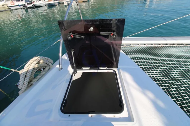  Yacht Photos Pics Open hatch on 2021 Fountaine Pajot Astrea 42 catamaran, docked at marina.