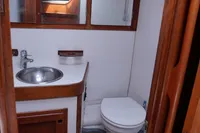 1989 Scandinavian Cruiser Eagle bathroom with wooden accents and compact design.