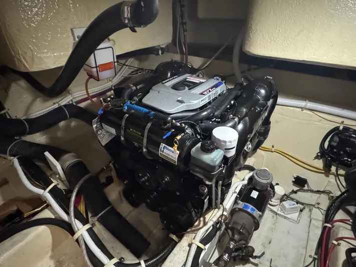 Aflecktion III Yacht Photos Pics Engine room of a 2014 Carver C37 yacht, featuring a detailed view of the engine.