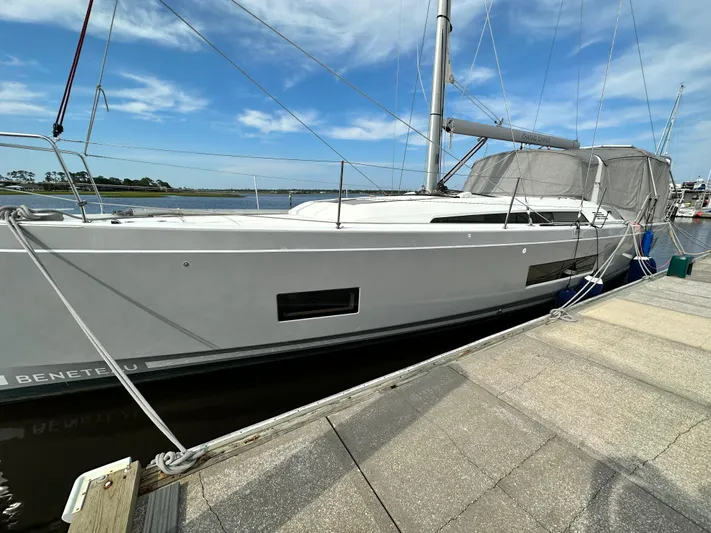 Chasing Summer Yacht Photos Pics 2022 Beneteau Oceanis 46.1 yacht docked, showcasing sleek design and modern features.