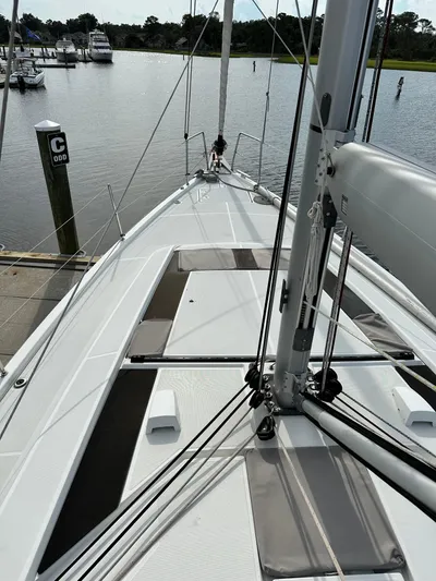Chasing Summer Yacht Photos Pics Beneteau Oceanis 46.1 sailboat deck, 2022 model, docked at marina.