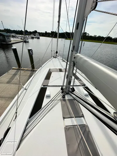 Chasing Summer Yacht Photos Pics Beneteau Oceanis 46.1 sailboat docked at marina, 2022 model, view from deck.