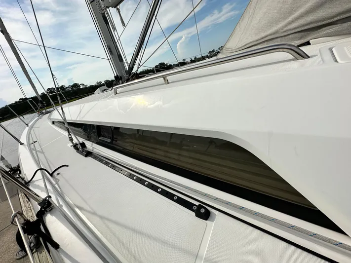 Chasing Summer Yacht Photos Pics 2022 Beneteau Oceanis 46.1 sailboat deck with sleek design and modern features.