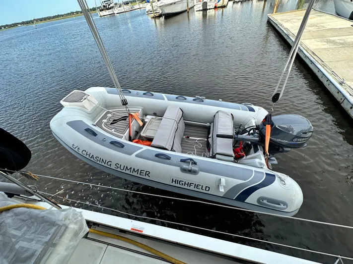 Chasing Summer Yacht Photos Pics Inflatable boat "Chasing Summer" docked, featuring Yamaha motor, near Beneteau Oceanis 46.1, 2022.