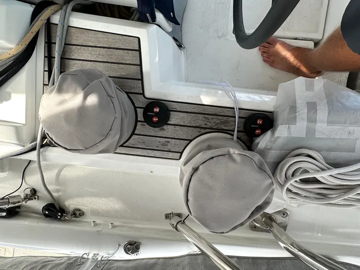 Chasing Summer Yacht Photos Pics Deck of 2022 Beneteau Oceanis 46.1 yacht with winches and ropes.