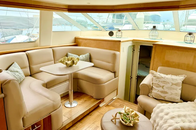 Lunasea Yacht Photos Pics Luxurious interior of a 1996 Carver 500 Cockpit Motor Yacht with plush seating and decor.