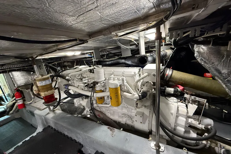 Lunasea Yacht Photos Pics Engine room of 1996 Carver 500 Cockpit Motor Yacht, showcasing mechanical components.