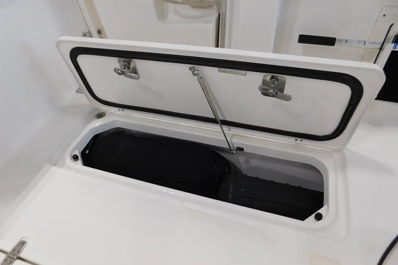 Three Point O.h. Yacht Photos Pics Open storage compartment on 2022 Pursuit S 328 Sport boat.