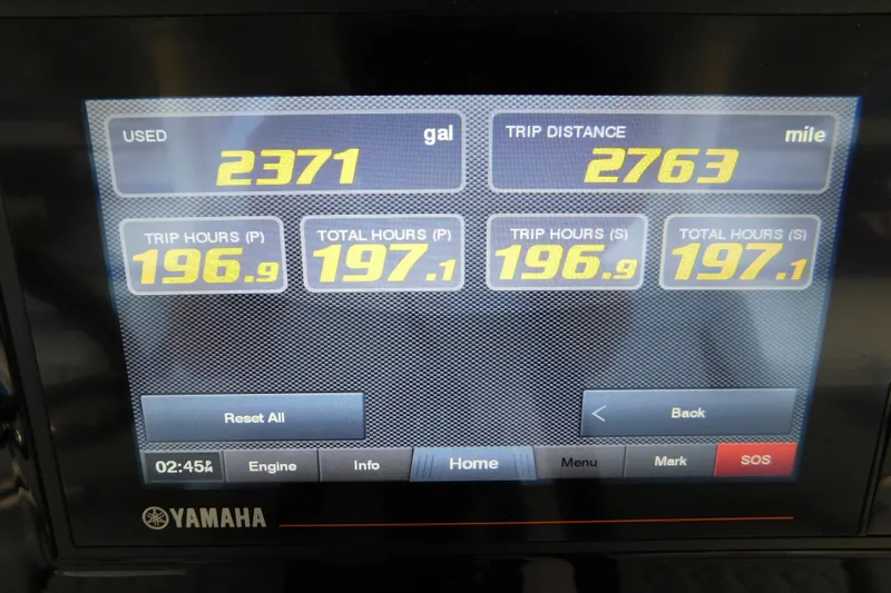 Three Point O.h. Yacht Photos Pics Display screen showing fuel usage, trip distance, and engine hours for 2022 Pursuit S 328 Sport.