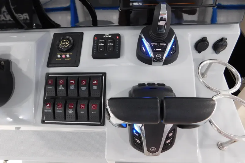 Three Point O.h. Yacht Photos Pics Control panel of 2022 Pursuit S 328 Sport boat with Yamaha throttle and switches.
