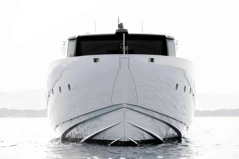 Anmax Yacht Photos Pics Front view of 2022 Sanlorenzo SP110 yacht on calm water.