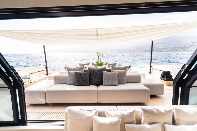 Anmax Yacht Photos Pics Luxurious 2022 Sanlorenzo SP110 yacht interior with elegant seating and ocean view.