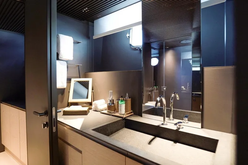 Anmax Yacht Photos Pics Luxurious bathroom interior on 2022 Sanlorenzo SP110 yacht, featuring modern fixtures and elegant design.