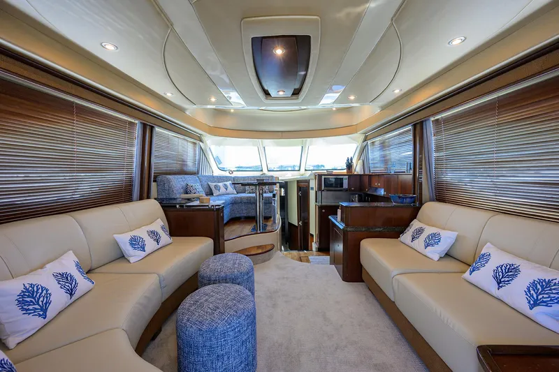 Yes Dear Yacht Photos Pics Luxurious interior of 2005 Sea Ray 52 Sedan Bridge yacht with elegant seating and decor.