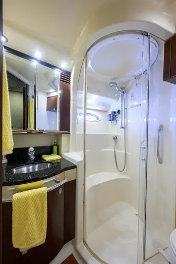 Yes Dear Yacht Photos Pics Luxurious bathroom in 2005 Sea Ray 52 Sedan Bridge yacht with modern shower and sink.