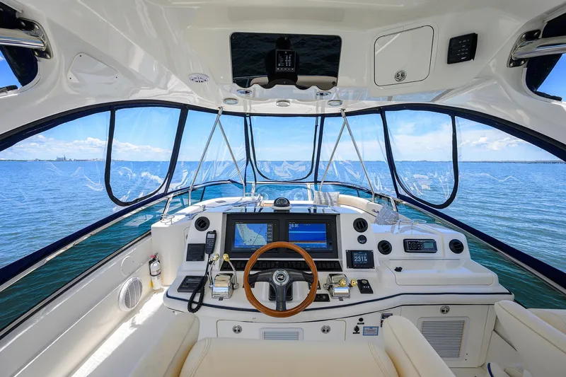 Yes Dear Yacht Photos Pics 2005 Sea Ray 52 Sedan Bridge helm with panoramic ocean view and advanced navigation system.