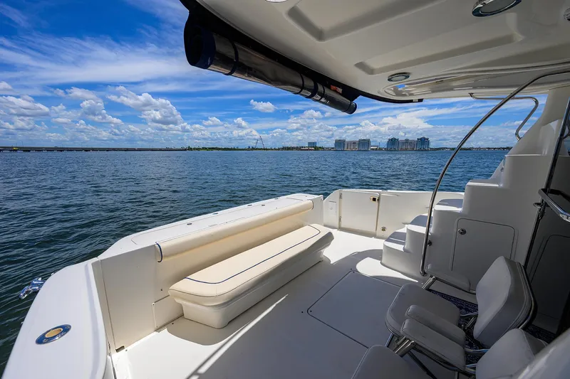 Yes Dear Yacht Photos Pics 2005 Sea Ray 52 Sedan Bridge yacht deck with ocean view and seating area.