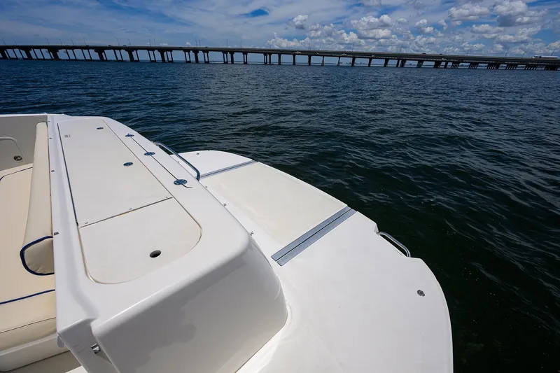 Yes Dear Yacht Photos Pics 2005 Sea Ray 52 Sedan Bridge yacht on water with bridge in background.