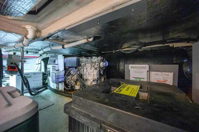 Yes Dear Yacht Photos Pics Engine room of 2005 Sea Ray 52 Sedan Bridge yacht, showcasing machinery and equipment.