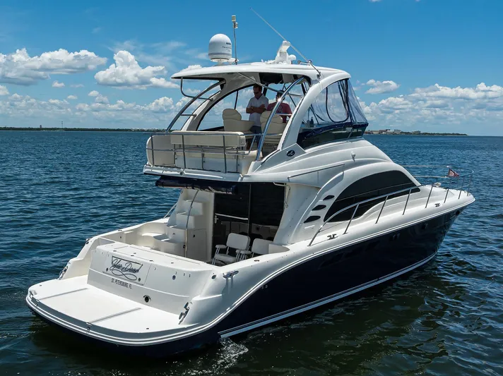 Yes Dear Yacht Photos Pics 2005 Sea Ray 52 Sedan Bridge yacht cruising on a sunny day.