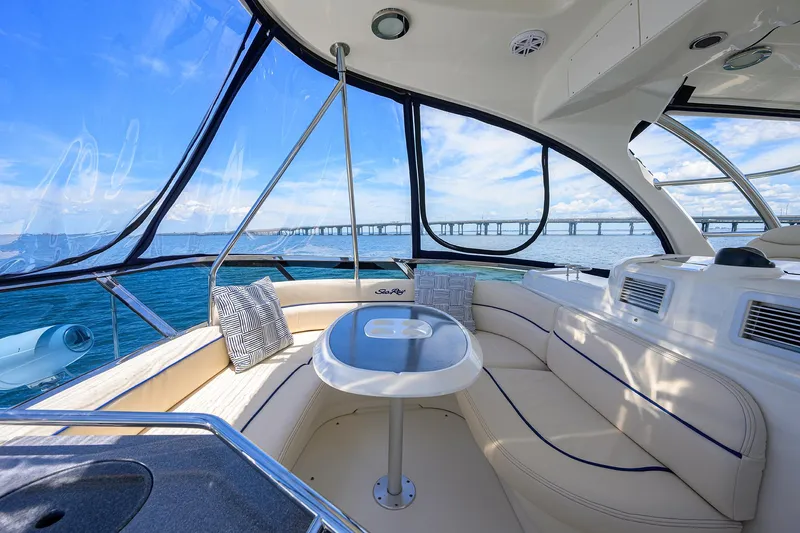 Yes Dear Yacht Photos Pics Luxurious interior of 2005 Sea Ray 52 Sedan Bridge yacht with ocean view.