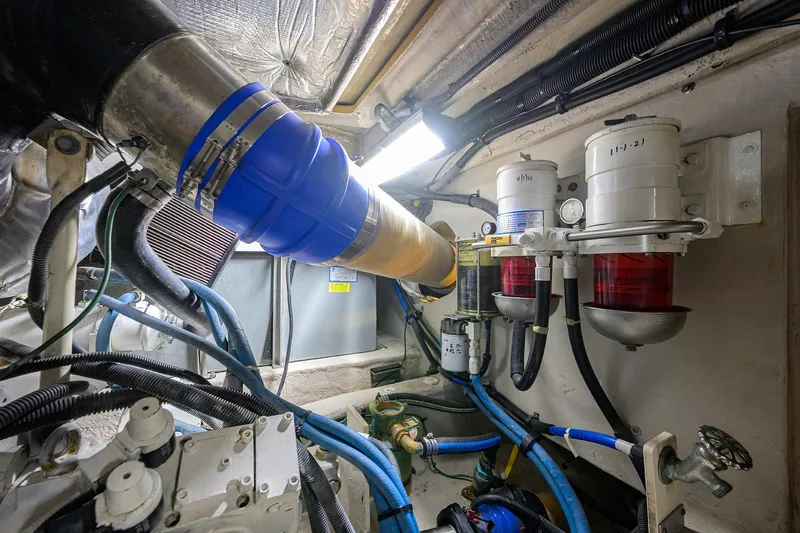 Yes Dear Yacht Photos Pics Engine room of 2005 Sea Ray 52 Sedan Bridge with visible fuel filters and hoses.