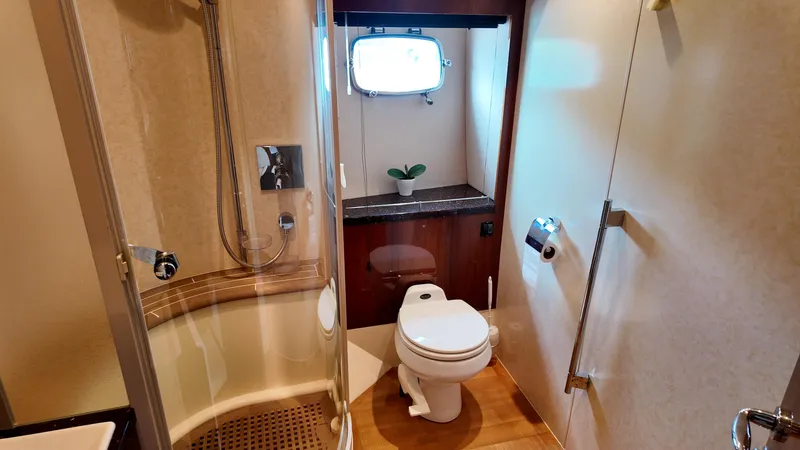  Yacht Photos Pics Luxurious bathroom in 2008 Fairline Squadron 74 yacht with shower and toilet.