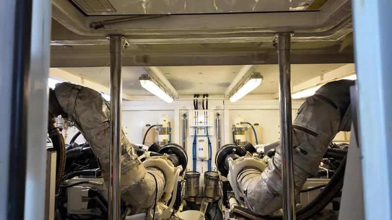  Yacht Photos Pics Engine room of 2008 Fairline Squadron 74 yacht, featuring complex machinery and piping.