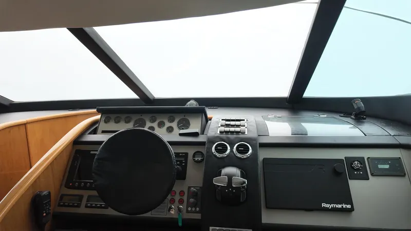  Yacht Photos Pics Helm of 2008 Fairline Squadron 74 yacht with modern navigation controls.