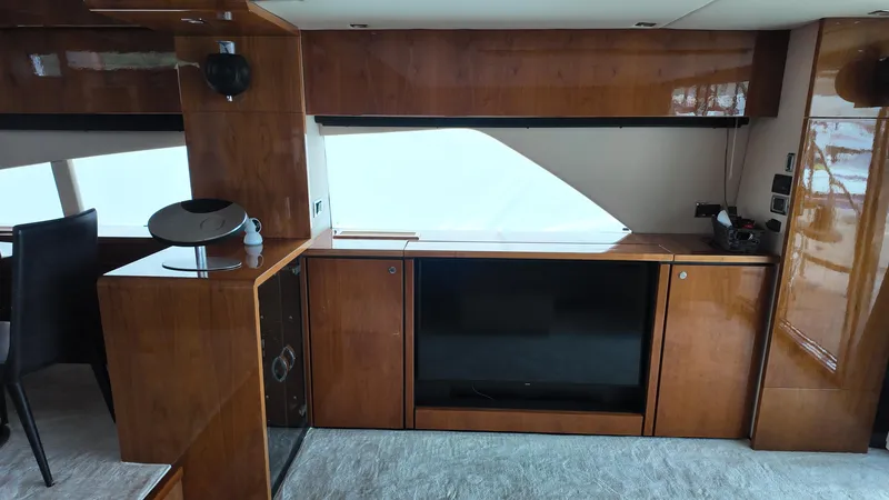  Yacht Photos Pics Luxurious interior of 2008 Fairline Squadron 74 yacht with elegant wood finish.