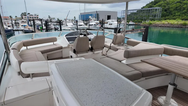  Yacht Photos Pics Luxurious 2008 Fairline Squadron 74 yacht interior with spacious seating and marina view.