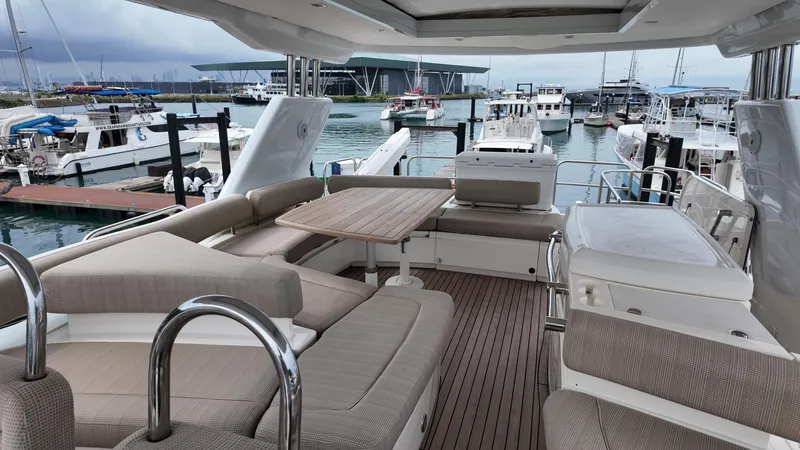 Yacht Photos Pics Luxurious 2008 Fairline Squadron 74 yacht interior with spacious seating and marina view.