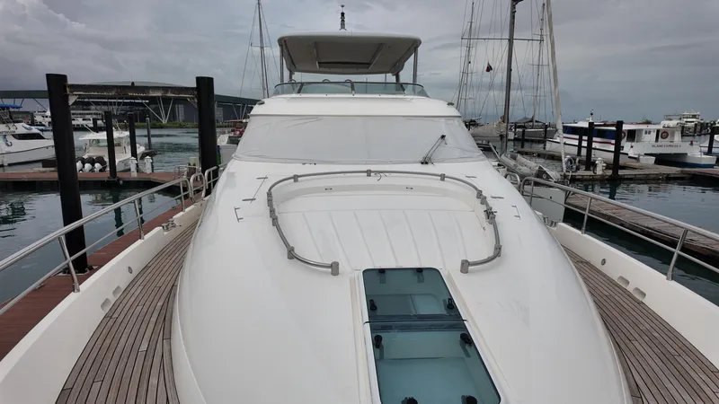  Yacht Photos Pics 2008 Fairline Squadron 74 yacht docked at marina, showcasing sleek design and spacious deck.