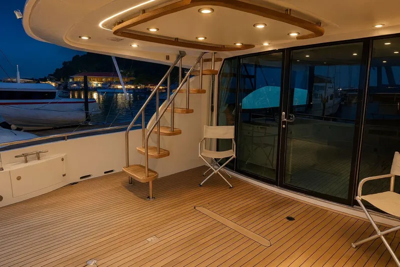  Yacht Photos Pics Luxurious 2008 Fairline Squadron 74 yacht deck with elegant lighting and marina view.