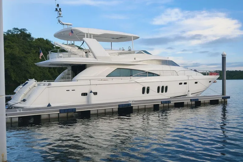  Yacht Photos Pics Luxury 2008 Fairline Squadron 74 yacht docked on calm water.