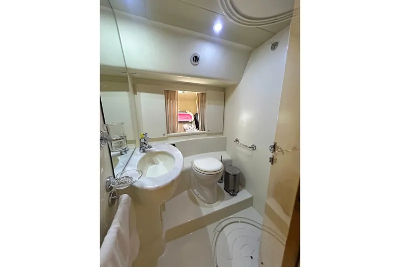  Yacht Photos Pics Luxurious bathroom in 2008 Fairline Squadron 74 yacht, featuring modern fixtures and elegant design.